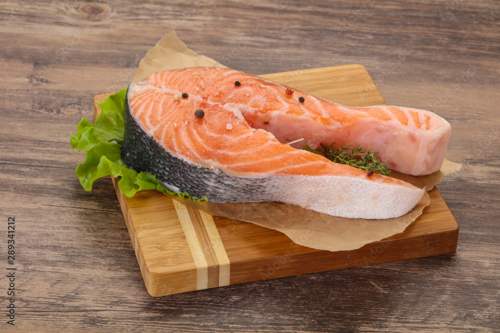 Raw salmon steak - ready for grill Raw salmon steak - ready for grill