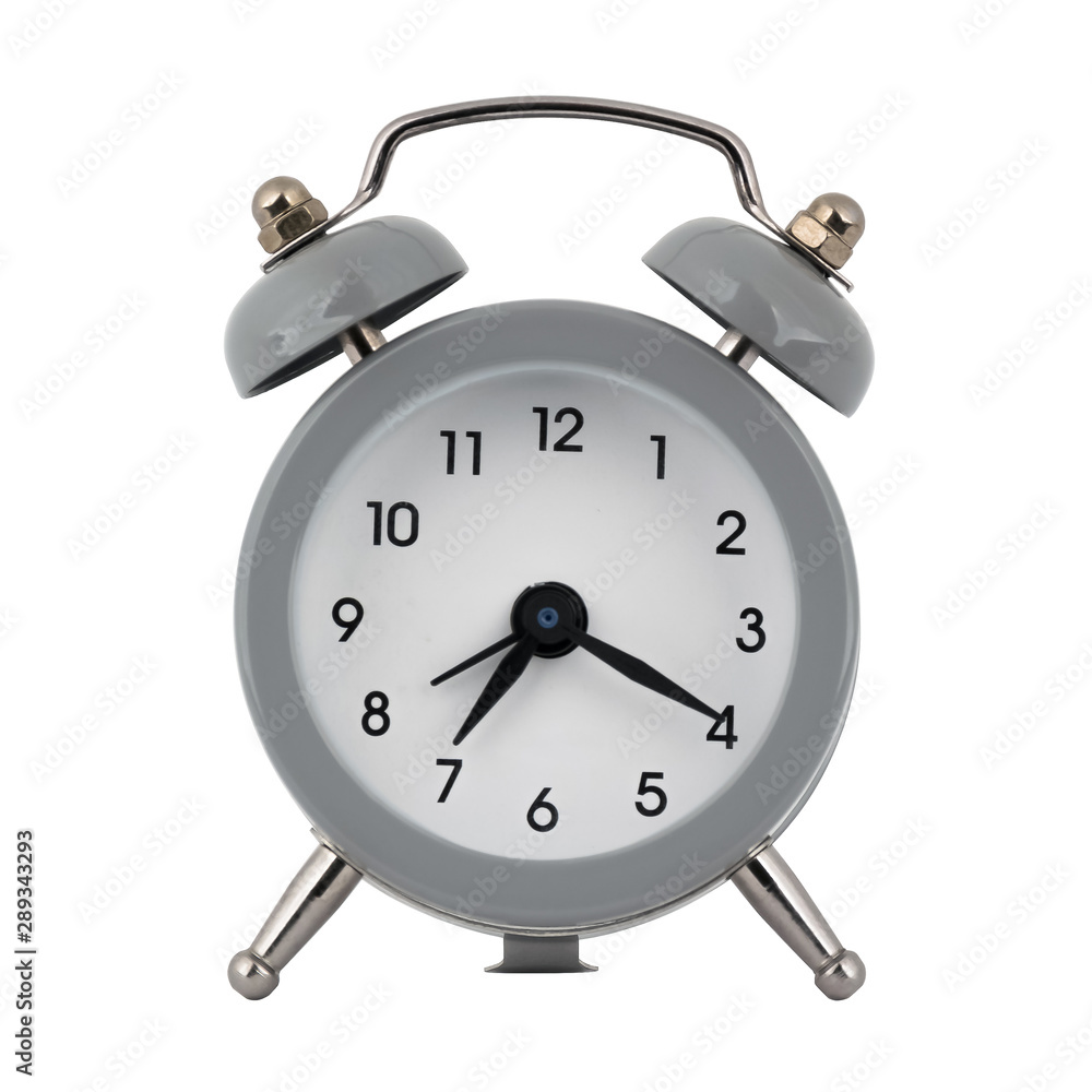 A gray clock with an alarm clock on a white background with arrows showing the time seven hours twenty minutes or nineteen hours twenty minutes A gray clock with an alarm clock on a white background with arrows showing the time seven hours twenty minutes or nineteen hours twenty minutes