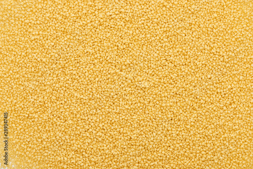 top view of uncooked organic couscous groat