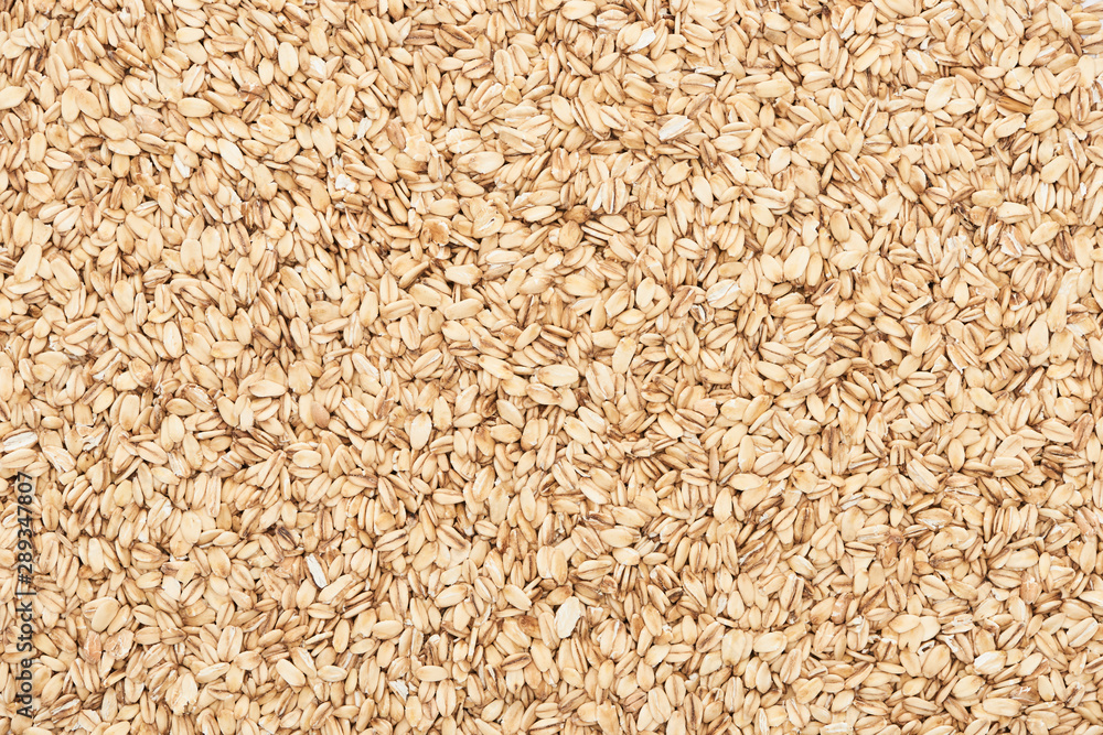 top view of uncooked pressed organic oats top view of uncooked pressed organic oats