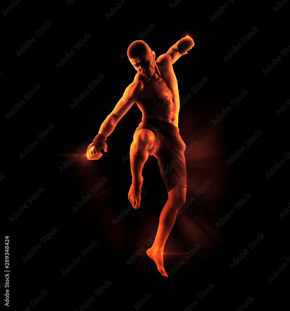 MMA male fighter kick. Flames background