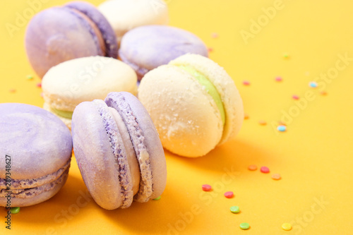 macaroon cakes on a colored background.