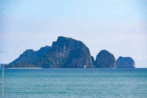 Beautiful sea view on the island  with plant-covered mountains  and emerald water.