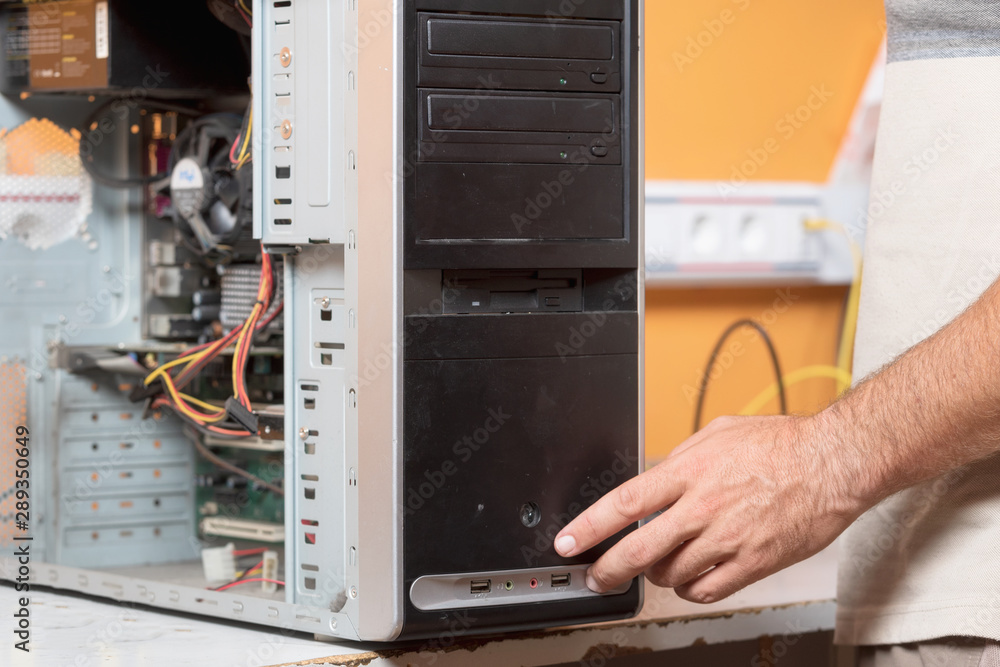 Technician repairing the computer. Concept of computer hardware, repairing, upgrade and technology . Technician repairing the computer. Concept of computer hardware, repairing, upgrade and technology .