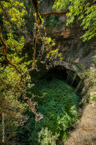  Deep natural sink hole in Grisel  Aragon  Spain .