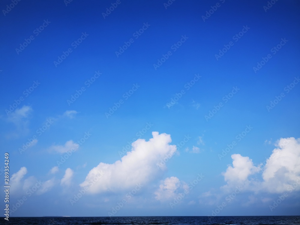 Bright blue sky with beautiful white clouds. Summer photo Bright blue sky with beautiful white clouds. Summer photo
