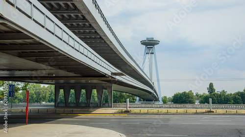 Photography A view of the UFO observation tower from the street near the SNP bridge