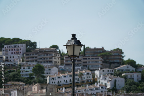 Lamp with city in the background 