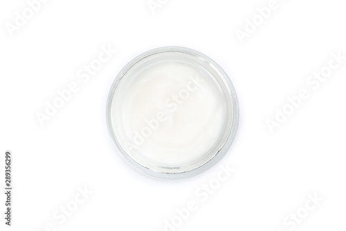 Cosmetic cream in glass jar isolated on white background