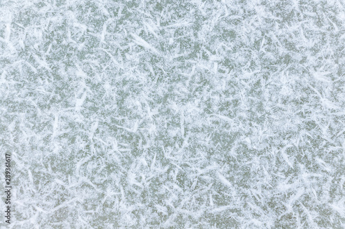 Texture of ice covered snow . Ice surface with original texture_