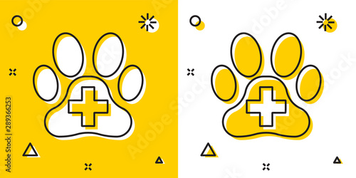 Black Veterinary clinic symbol icon isolated on yellow and white background. Cross hospital sign. A stylized paw print dog or cat. Pet First Aid sign. Random dynamic shapes. Vector Illustration