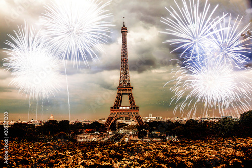 Photography celebrating the New Year in Paris Eiffel tower with fireworks