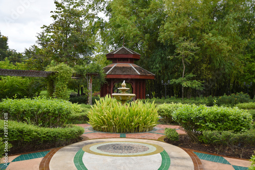 Kanchanaburi, Thailand, 09.09.2019: Beautiful garden, lake, traditional Thai, Siamese clothes, buildings of 