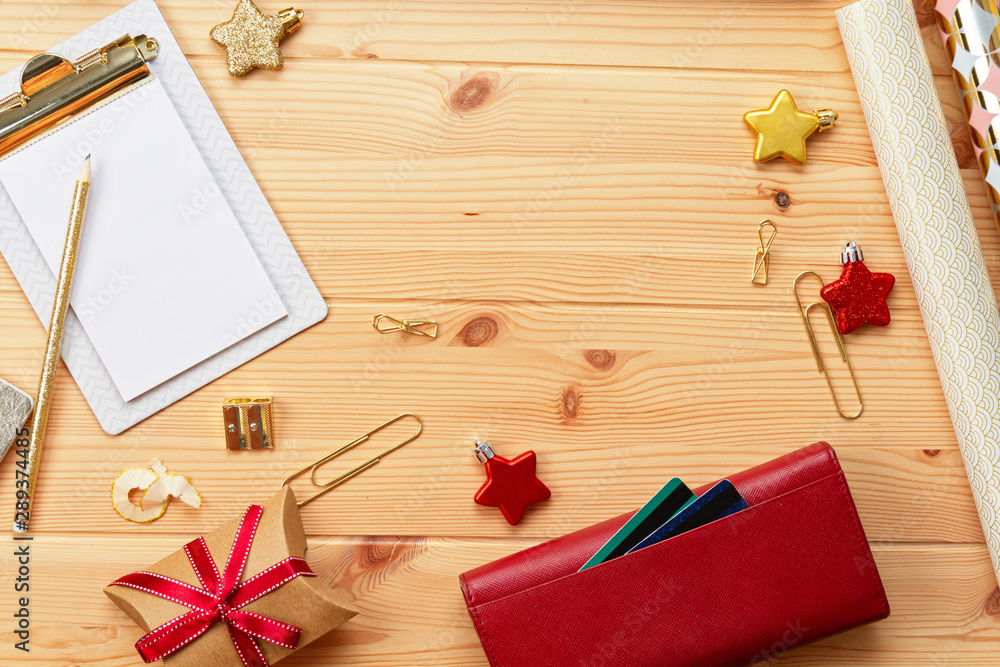 Laptop, credit cards, purse and christmas decoration. Online christmas shopping, buying gifts Laptop, credit cards, purse and christmas decoration. Online christmas shopping, buying gifts