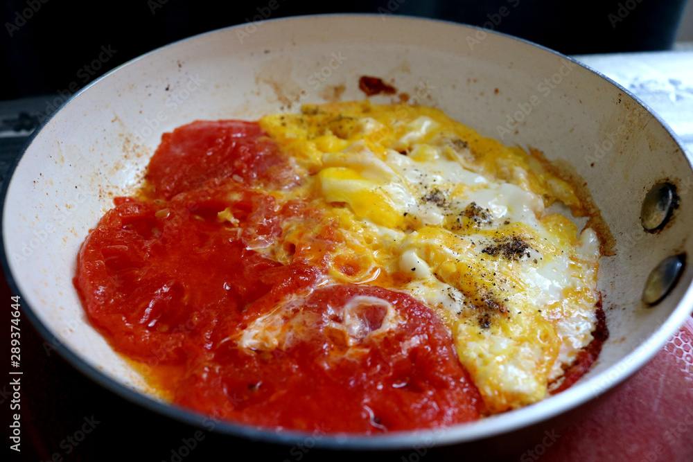 Traditional food menemen made by eggs and tomatoes. Traditional food menemen made by eggs and tomatoes.