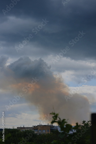 smoke from chimney on background of blue sky