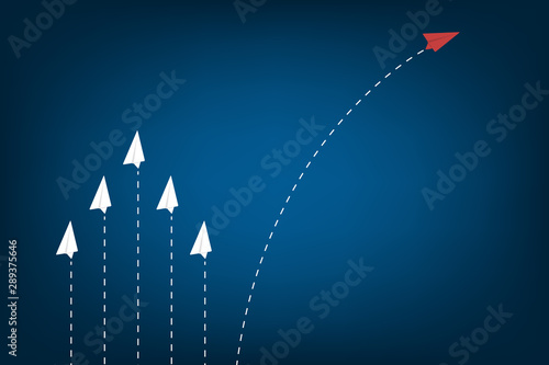 Think differently concept. Be different. Red airplane changing direction. New idea, change, trend, courage, creative solution, innovation and unique way concept,