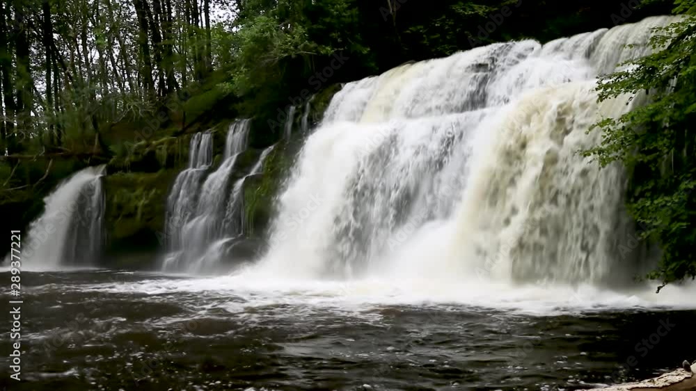 A beautiful waterfall in the Brecon Beacons of South Wales (Sgwd yr Pannwr) A beautiful waterfall in the Brecon Beacons of South Wales (Sgwd yr Pannwr)