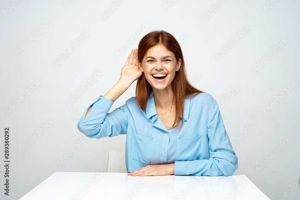 portrait of young woman sitting on floor portrait of young woman sitting on floor