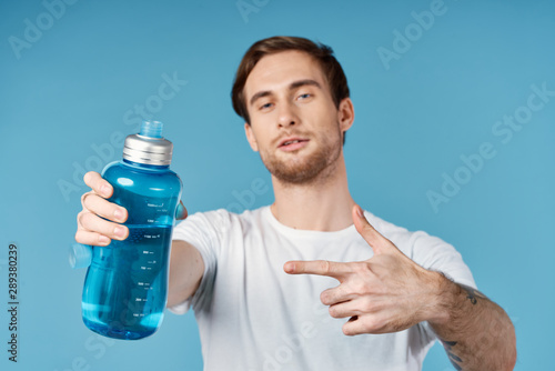 young man with bottle of water