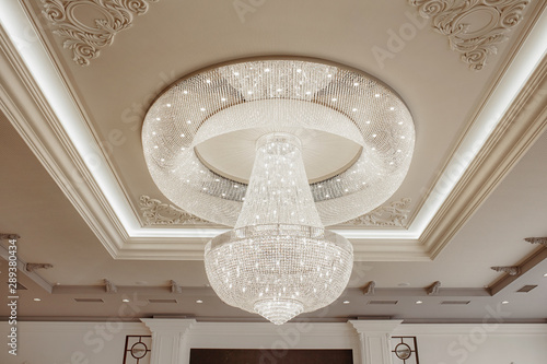 Photo of vintage crystal chandelier in the restaurant.