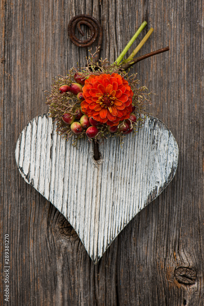 Wooden heart with little flower bouquet Wooden heart with little flower bouquet