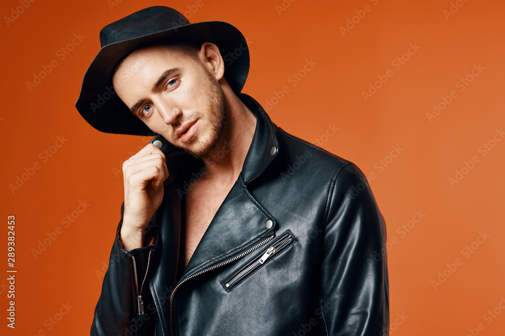 portrait of young man in black hat portrait of young man in black hat