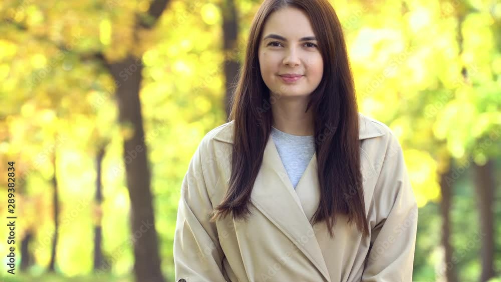 portrait fashionable pretty woman resting under tree in the woods in autumn portrait fashionable pretty woman resting under tree in the woods in autumn