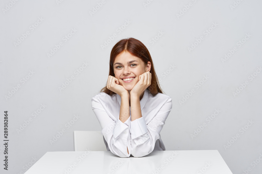 business woman sitting at desk with laptop business woman sitting at desk with laptop