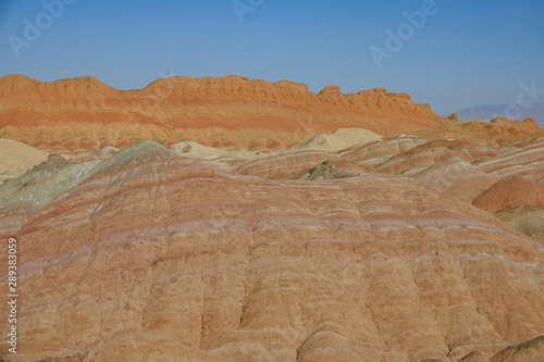 AERIAL: Picturesque aerial view of Danxia landform on a beautiful autumn day.