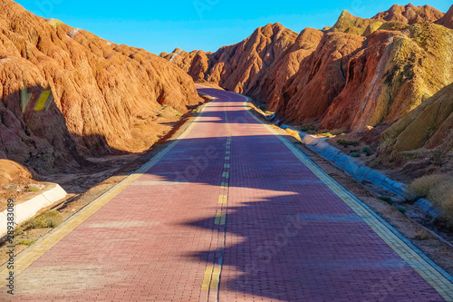 CLOSE UP: Cobblestone road offers a scenic view of the famous Rainbow Mountains.