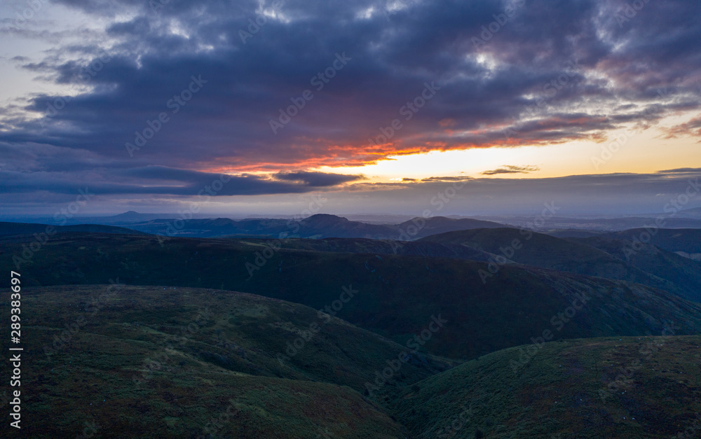 Dramatic Sunrise over Scenic Hills in UK