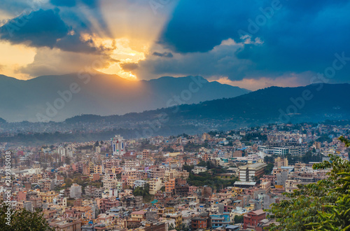 Panoramic view of city buildings in Kathmandu and colourful sunset in capital of Nepal.