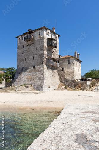 The old tower in town of Ouranopoli, Greece photo