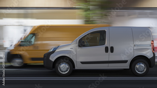 Nighttime Rendering of a Delivery Van Moving Along a Mini Van on the High Street 3D Rendering © beysim
