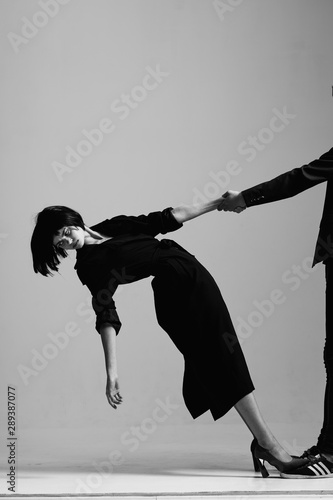 silhouette of young woman dancing