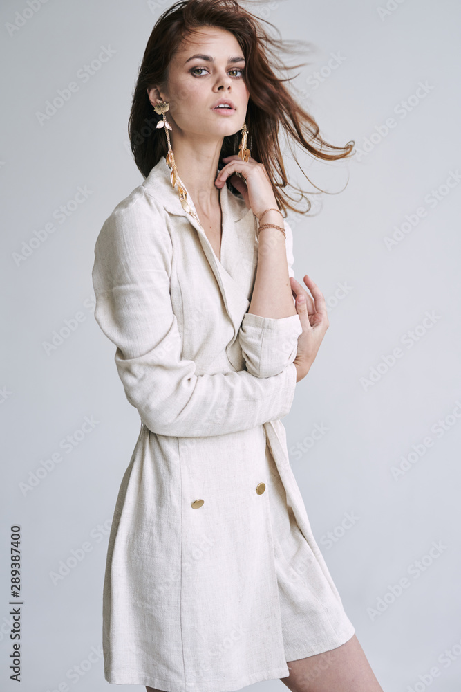 Beautiful woman in a charm dress