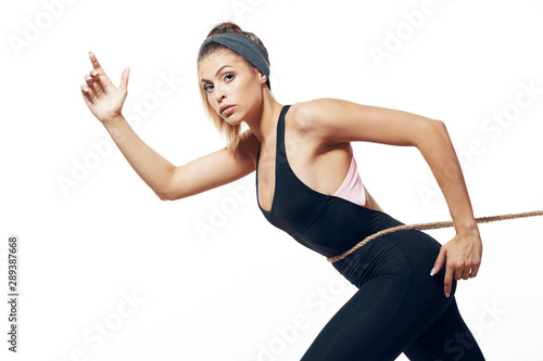 young woman doing fitness exercise © SHOTPRIME STUDIO