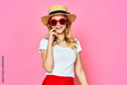 girl in a hat and sunglasses