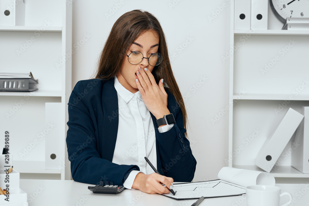 businesswoman talking on phone in office businesswoman talking on phone in office