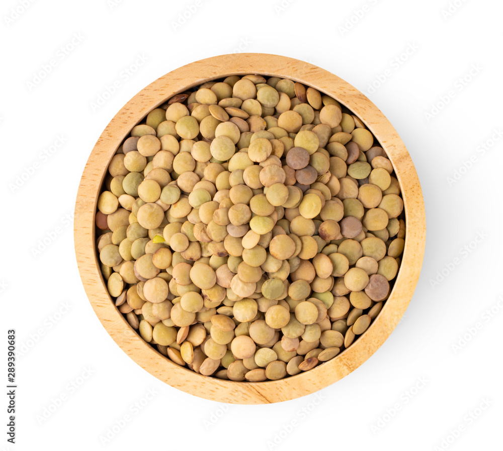 lentils in wood bowl isolated on white background. top view lentils in wood bowl isolated on white background. top view