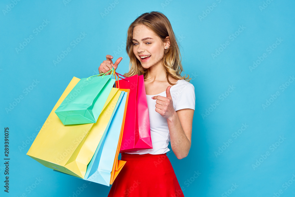 young woman with shopping bags