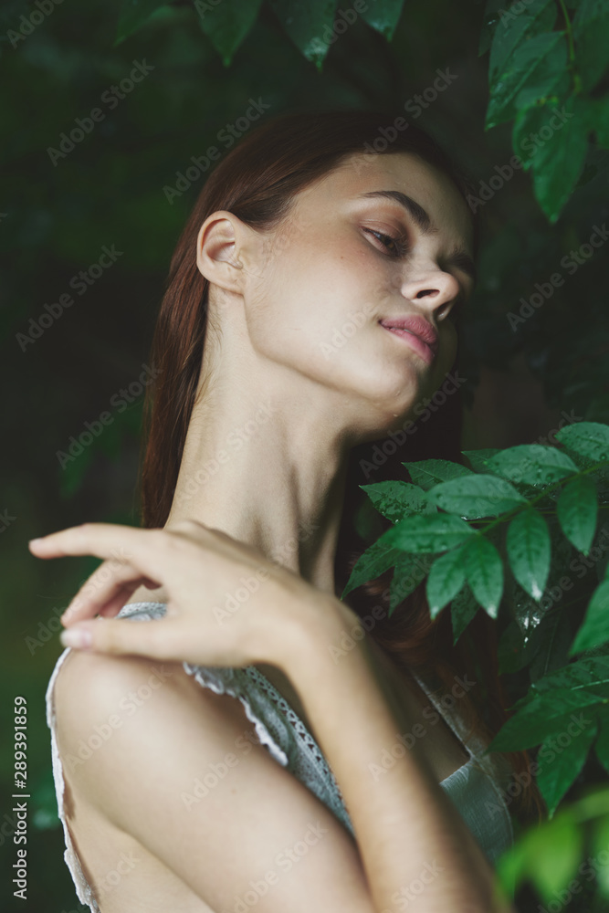 Beautiful woman green leaves nature Beautiful woman green leaves nature