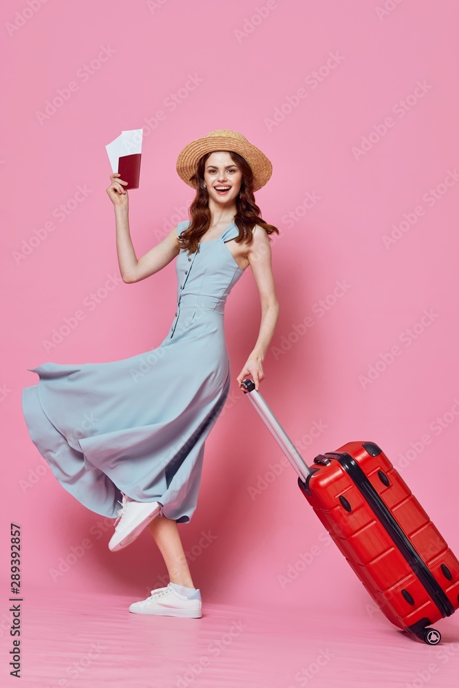 young woman with suitcase