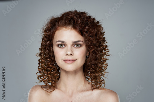 Beautiful woman curly hair make-up