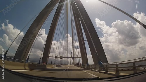 Driving across the world's largest suspension bridge of Rio Antirio in Greece. photo