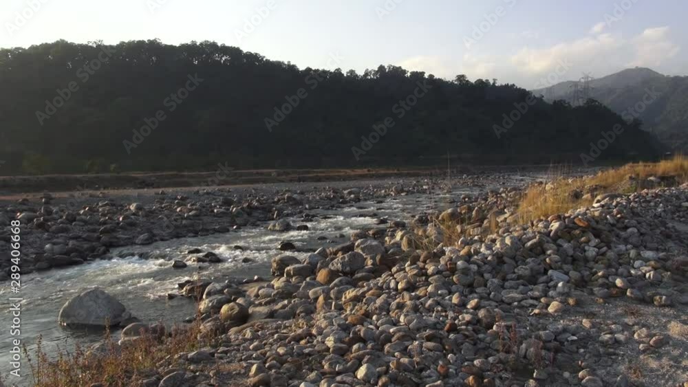 Beautiful river in for ground and hill behind it. Beautiful river in for ground and hill behind it.