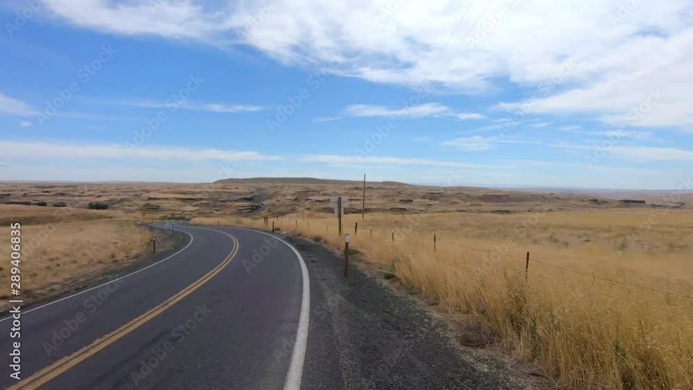Panoramic View of Highway that runs through the Scablands in Eastern Washington State Panoramic View of Highway that runs through the Scablands in Eastern Washington State