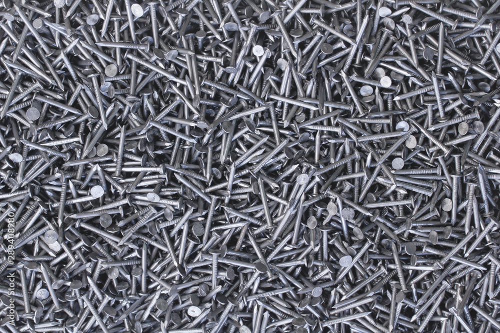 Background of metal nails top view close-up. Background from a variety of  building steel sharp nails macro. A big pile of nails. Stock Photo | Adobe  Stock