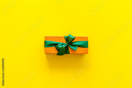 gifts on yellow background top view mock up